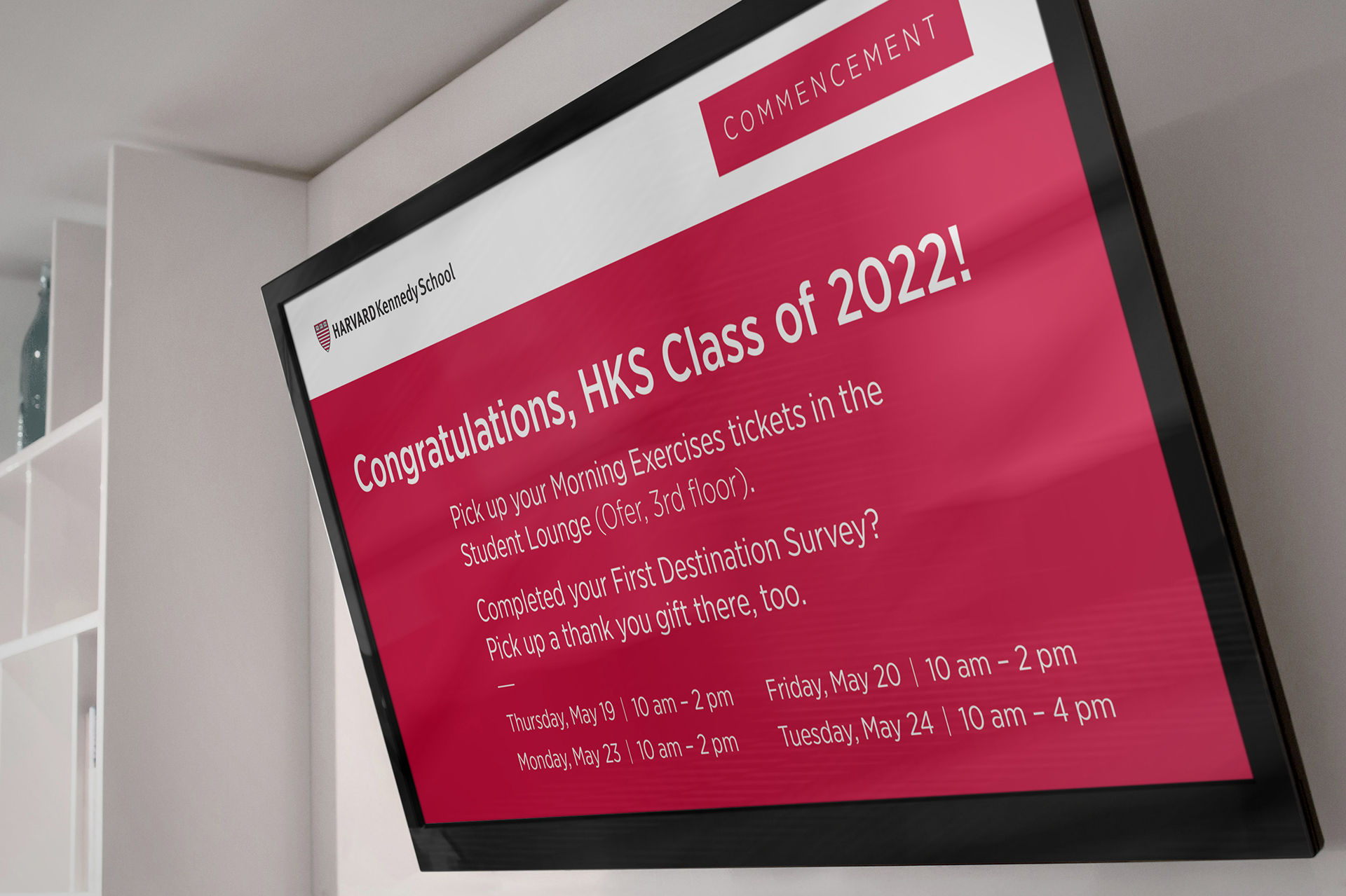 Cross campus digital screen displays important HKS Commencement details for students to read