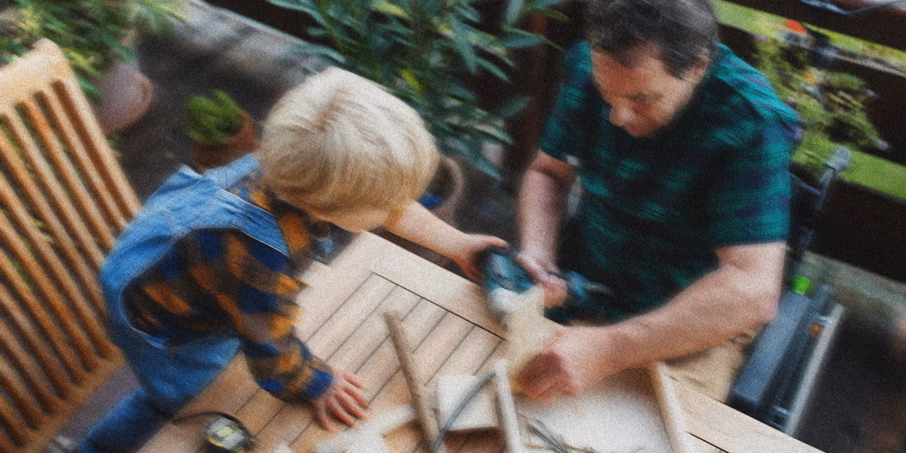 Older adult and child working on a project together. Website design for a leading Canadian pension plan.