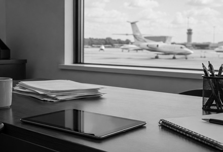 iPad and aviation documents representing Part 135 OpSpecs A061 and A025