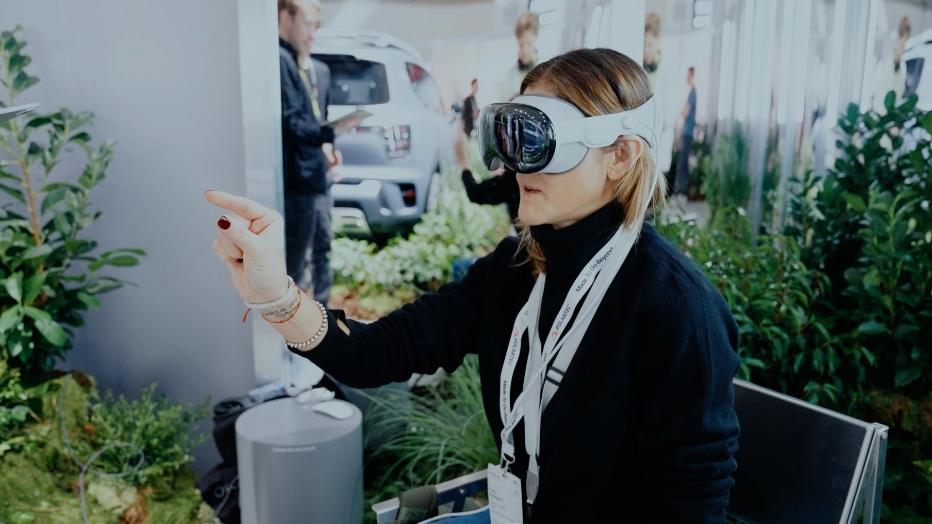 A woman experiences the smart #5 with WongDoody's Apple Vision Pro solution