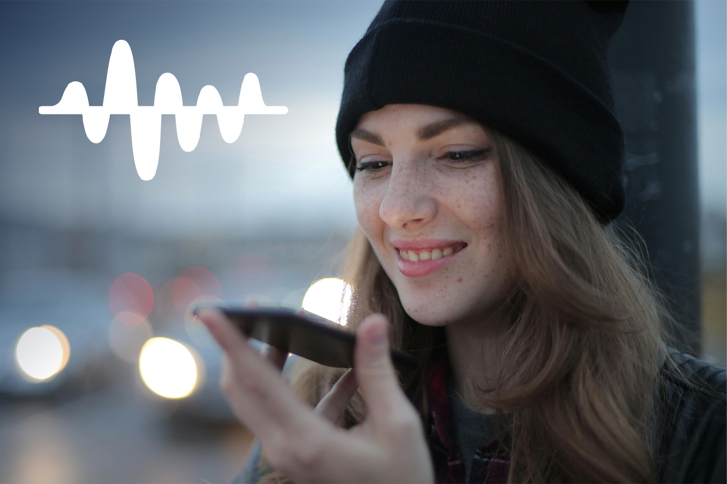 A woman uses the AI voice interface on her phone