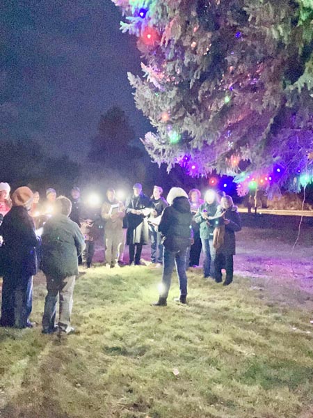 Upper Country Singers entertained at Midvale’s tree lighting Saturday evening. Photo credit: Bonnie Evans