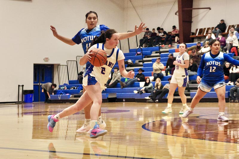 #2 Senior Hope Harrison makes a move in the Lady Titan’s game against Notus on December 2. The Titans won this game 32-23. Photo credit: The Record Reporter.