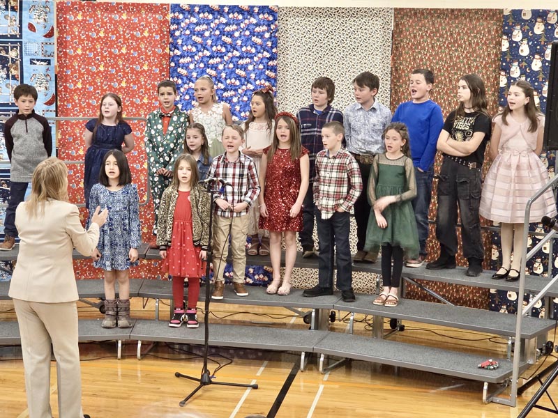 Meadows Valley 3rd & 4th Graders sing during the Christmas festivities.Photo credit: Rachel Reynaga.