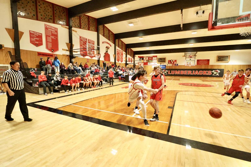 #22 Sophomore Jim Tucker passes from the baseline during Council’s game against Greenleaf on January 8. They won 43-38 and next play at HSB on January 15. Photo credit: The Record Reporter