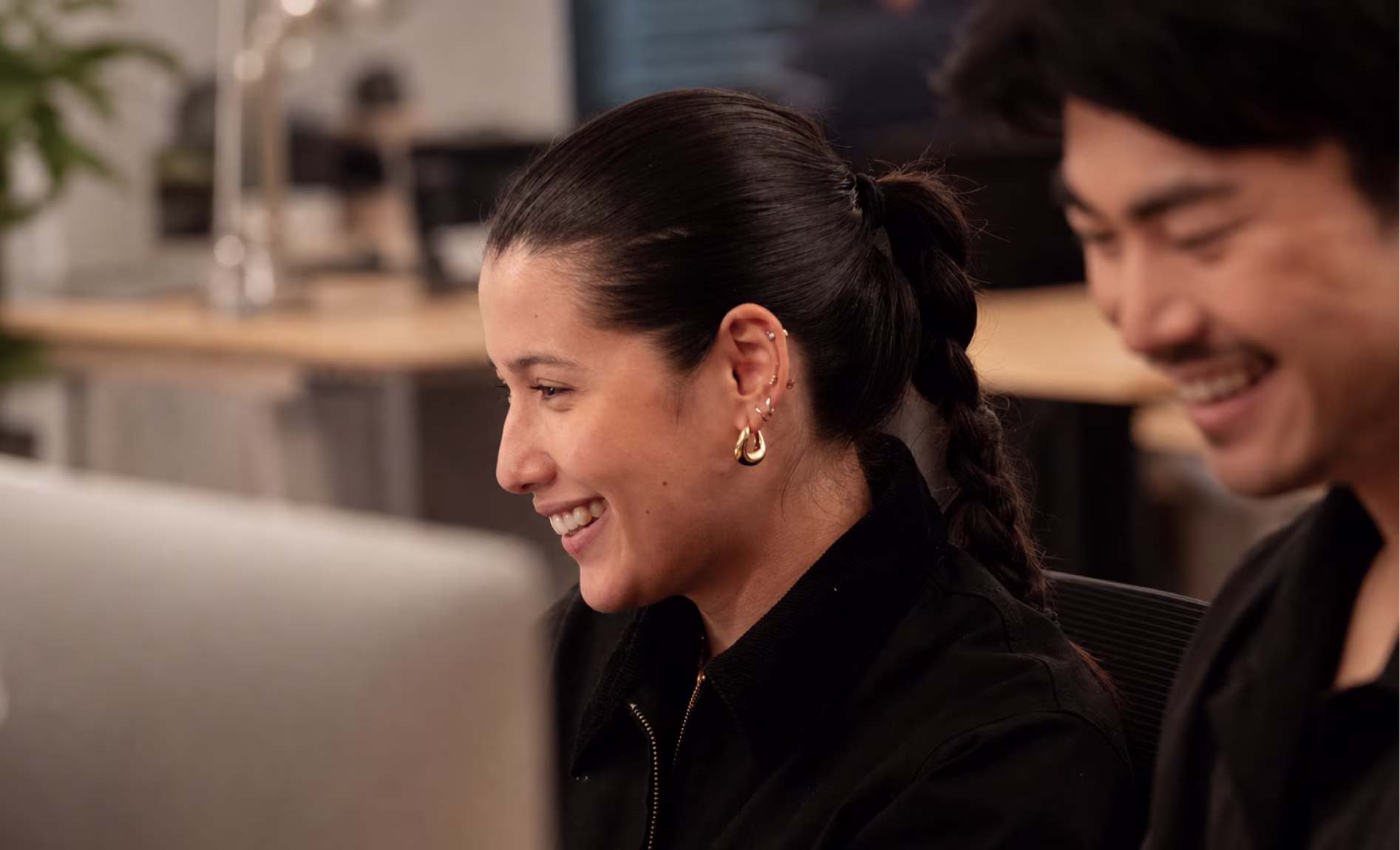 Image of co-workers laughing