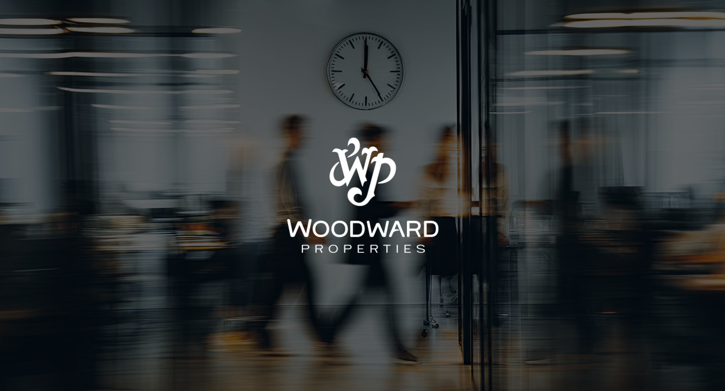 Image of everyday life in the office with a white logo on top of the image