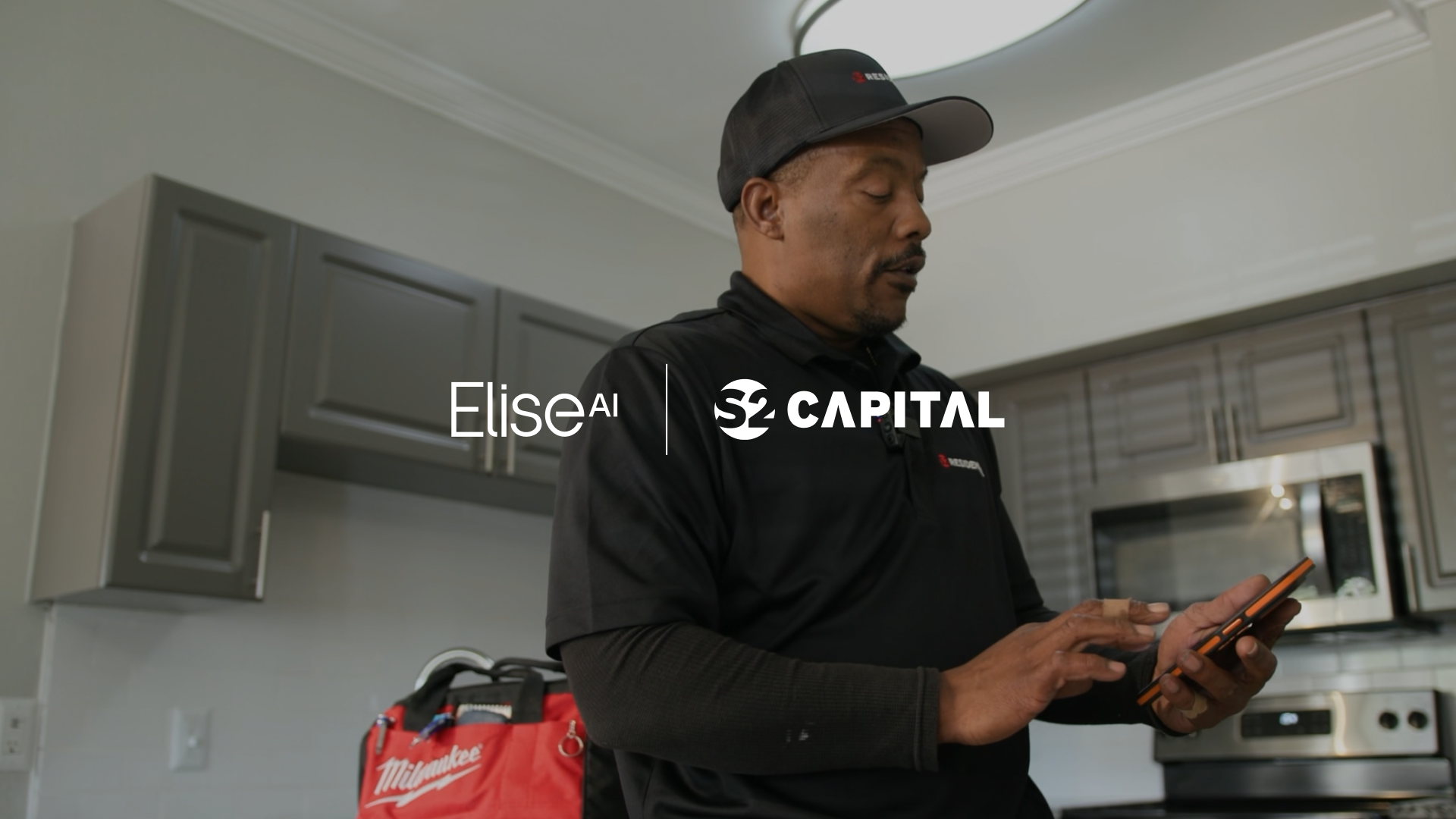Image of everyday life in the office with a white logo on top of the image