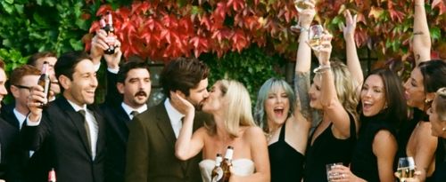 Bride and groom celebrate with their bridal party at their Italian wedding.