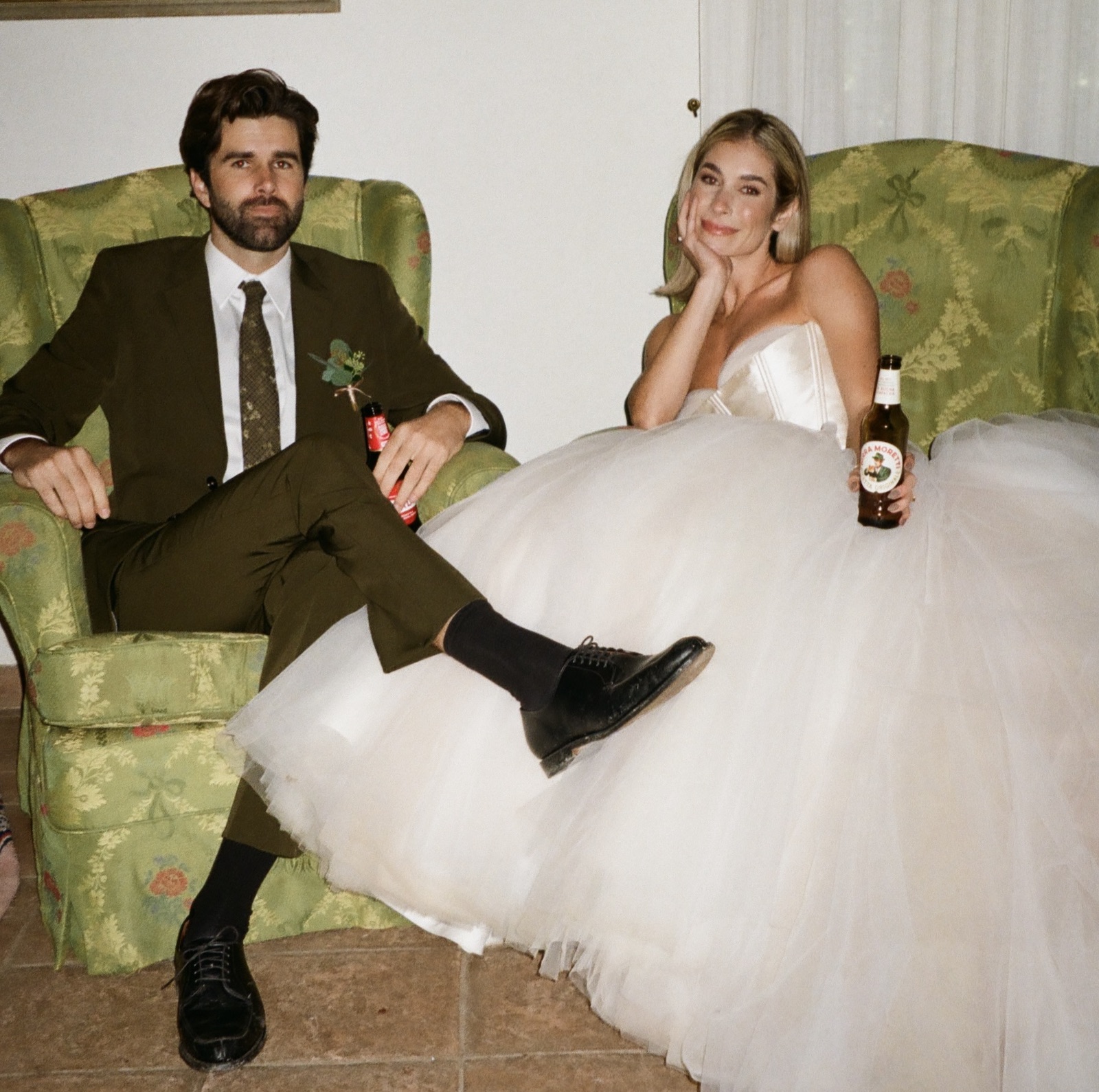 Bride and groom pose for wedding photos at their destination wedding.