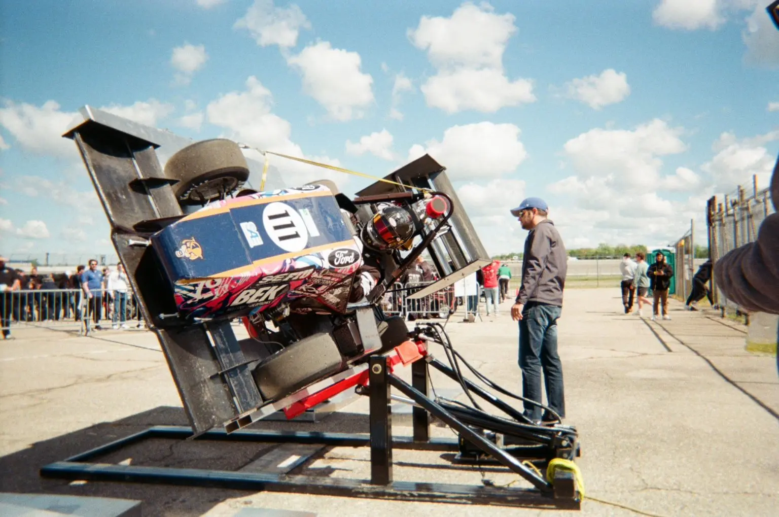 SAE FIU student-built race car displaying the BEK Milling sponsor logo at competition