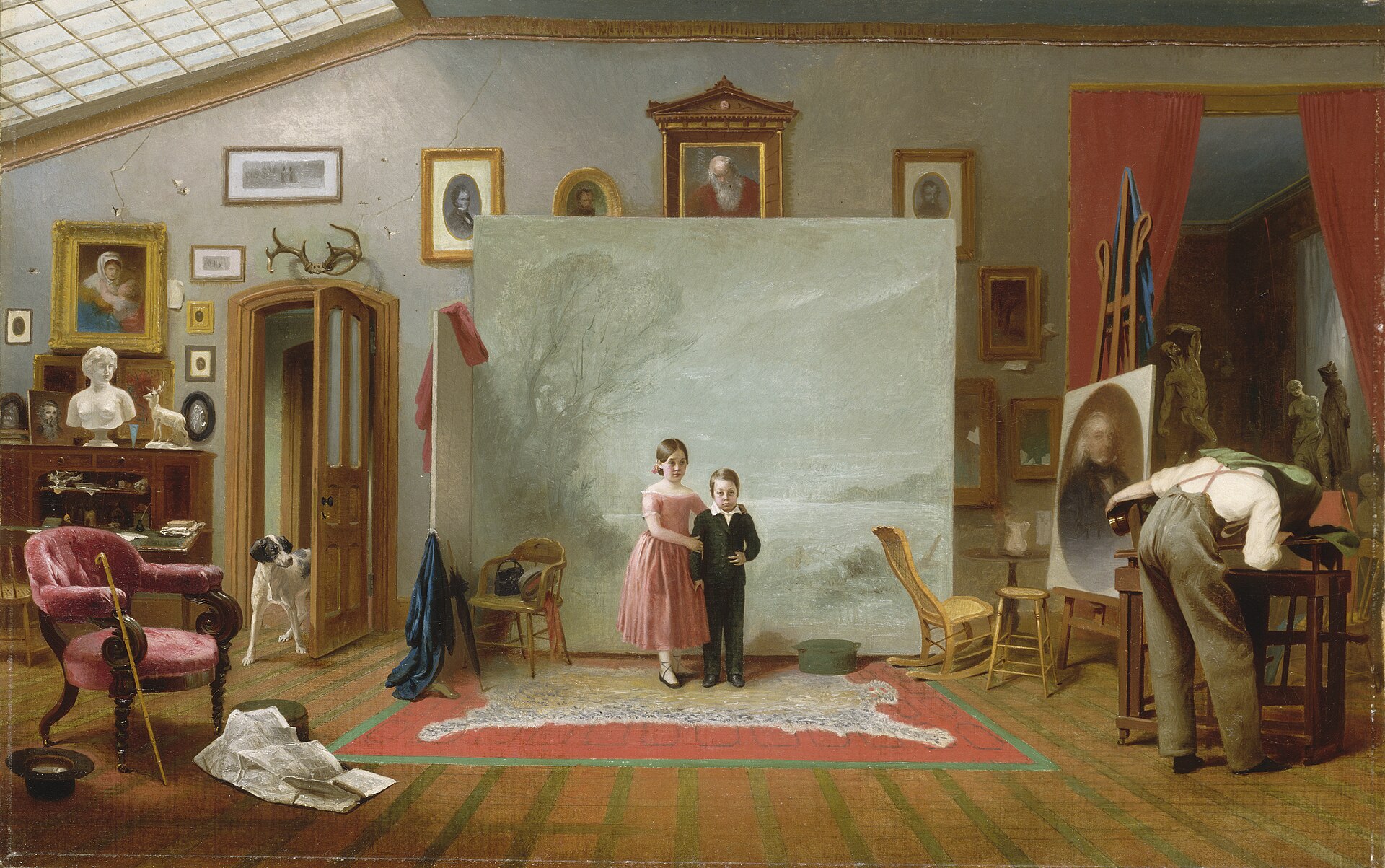 Historic interior filled with portraits