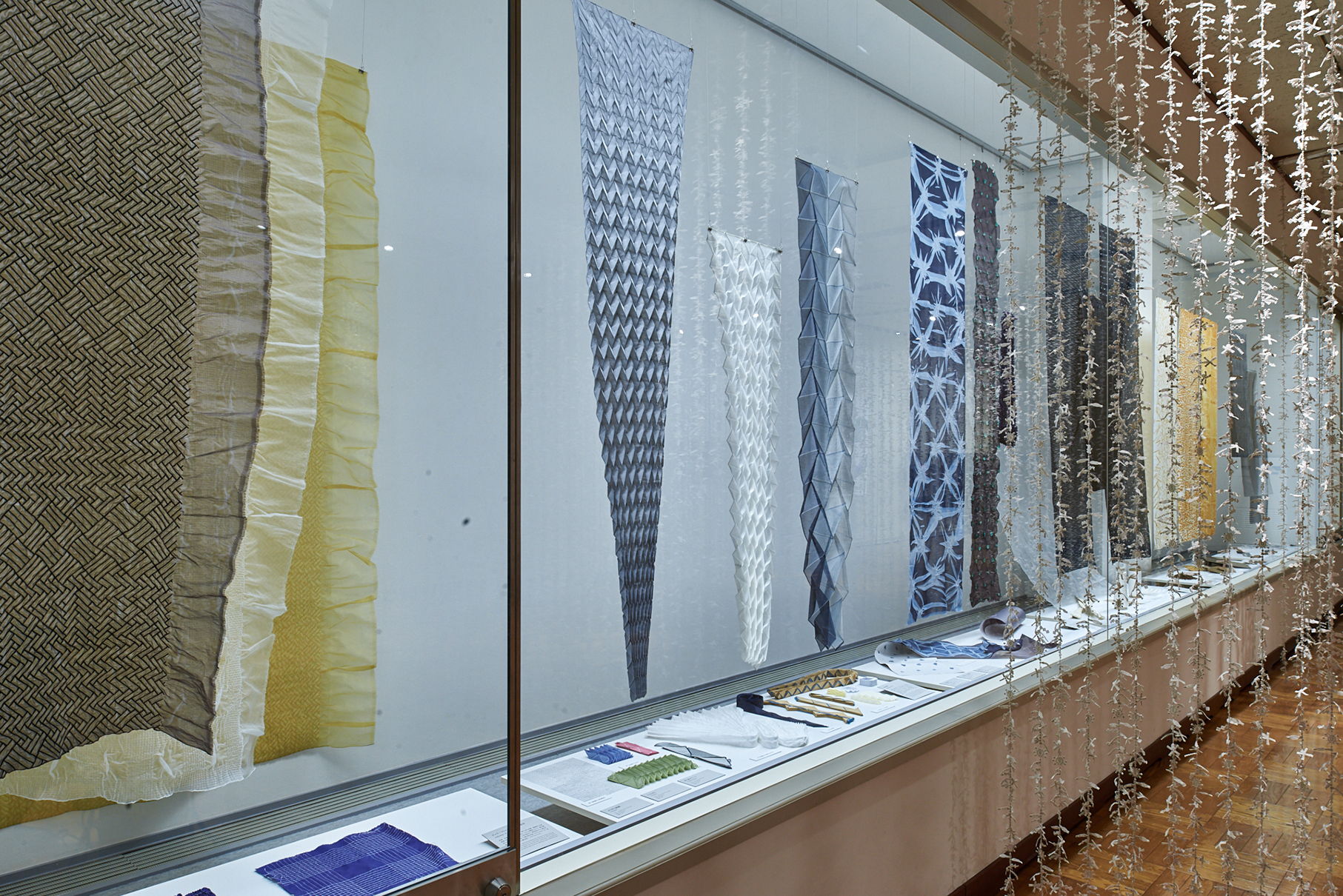 Display of NUNO textile samples and material studies, Misato Town Alumni Museum, 2023. Photo: Masayuki Hayashi; courtesy NUNO.