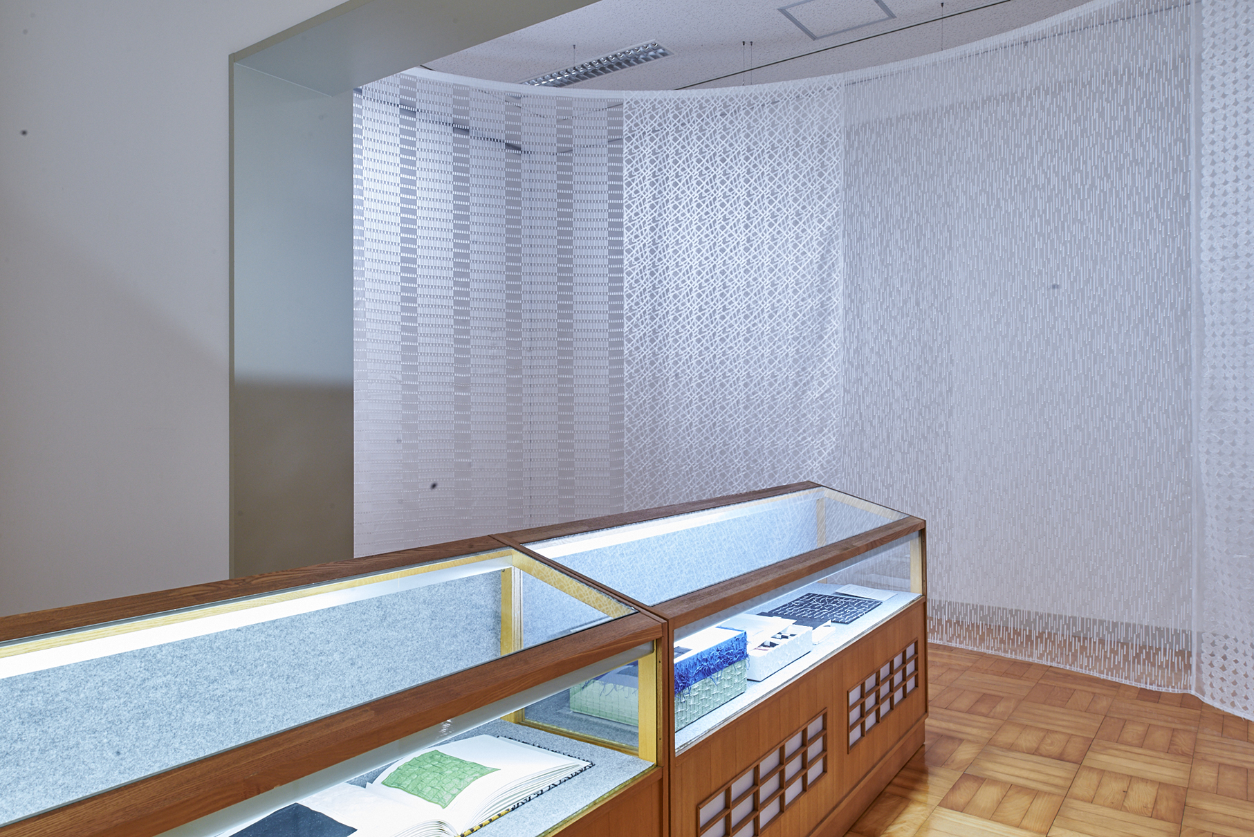 NUNO textile display with material samples, Misato Town Alumni Museum, 2023. Photo: Masayuki Hayashi; courtesy NUNO.