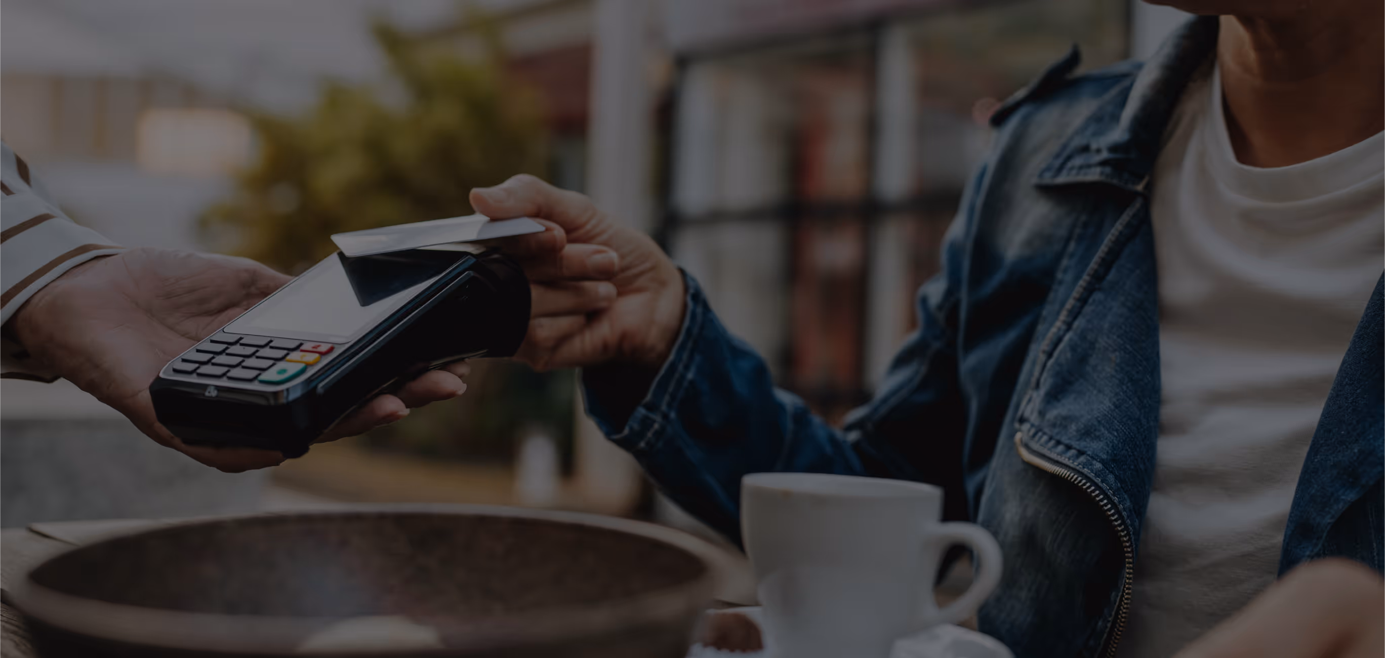 A person paying with card