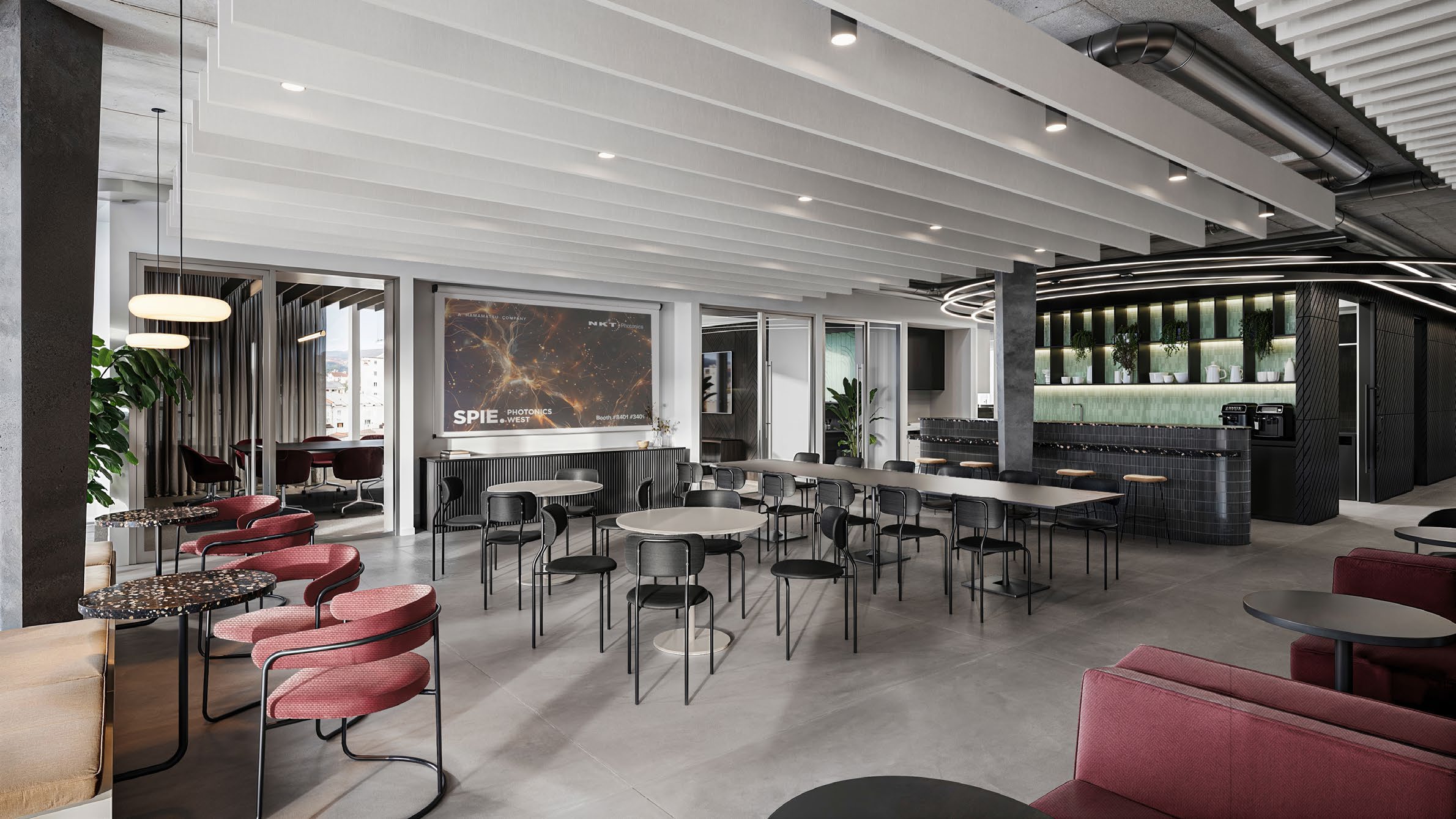 Unispace design rendering of the NKT Photonics canteen, with dining tables, burgundy chairs and a dark tea point.