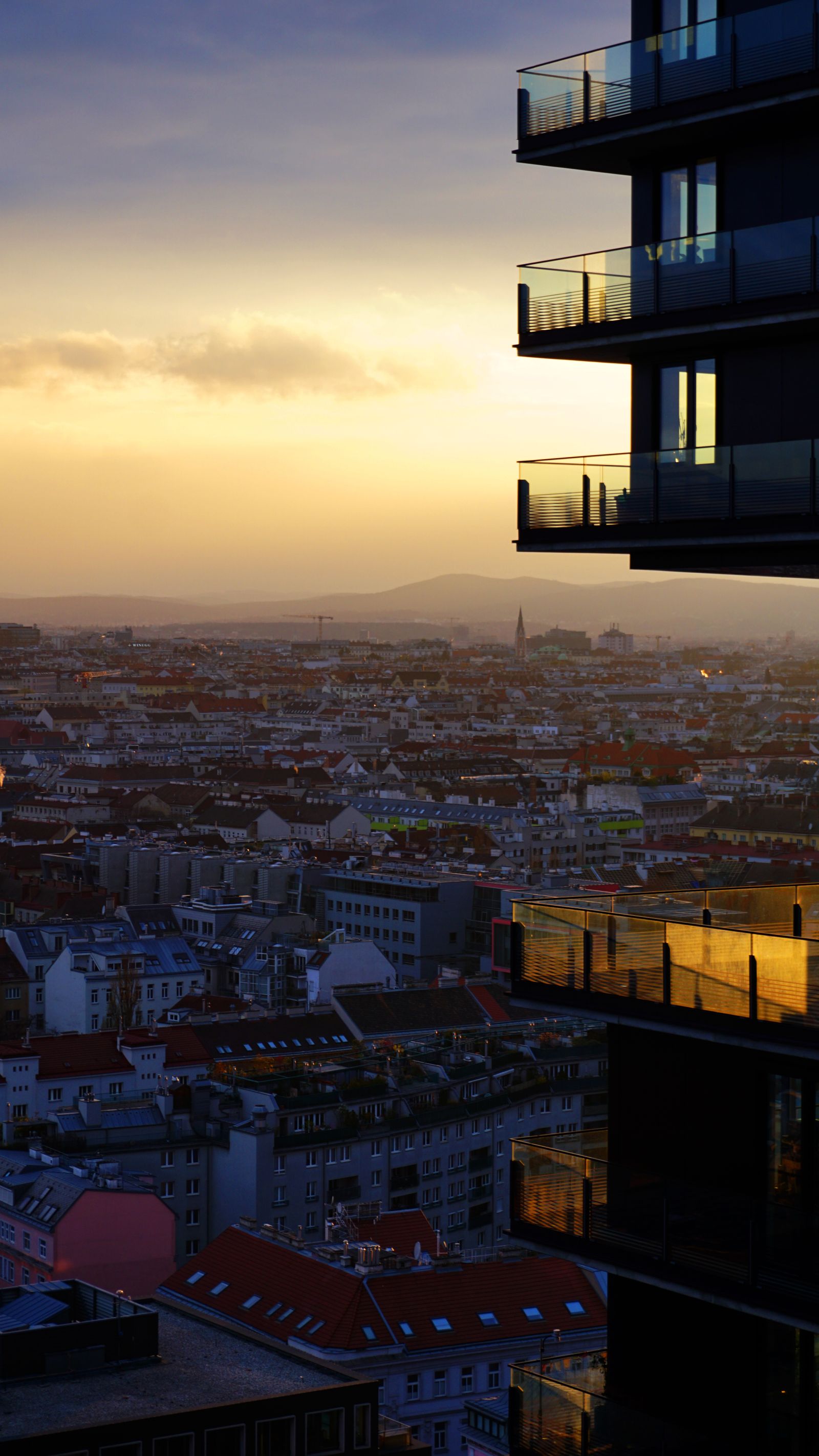 Vienna cityscape and modern buildings at sunset. Photo by Yevheniia Savchenko on Pexels.