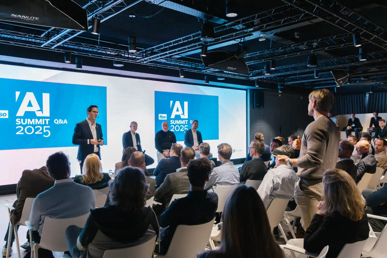 Wide view of speakers and audience at the HSO Microsoft event