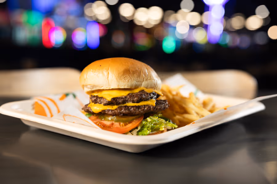 A kid eating at a table