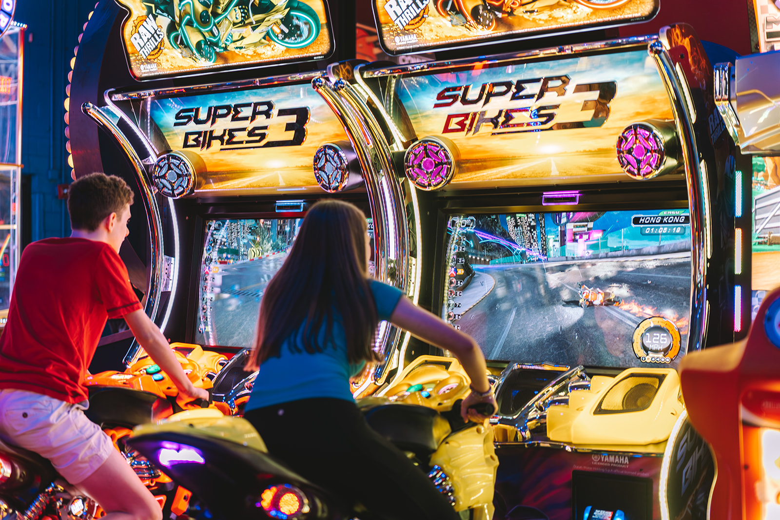 A kid is playing at game center