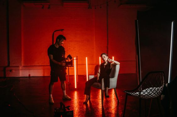 A red themed set for a fashion brand video production