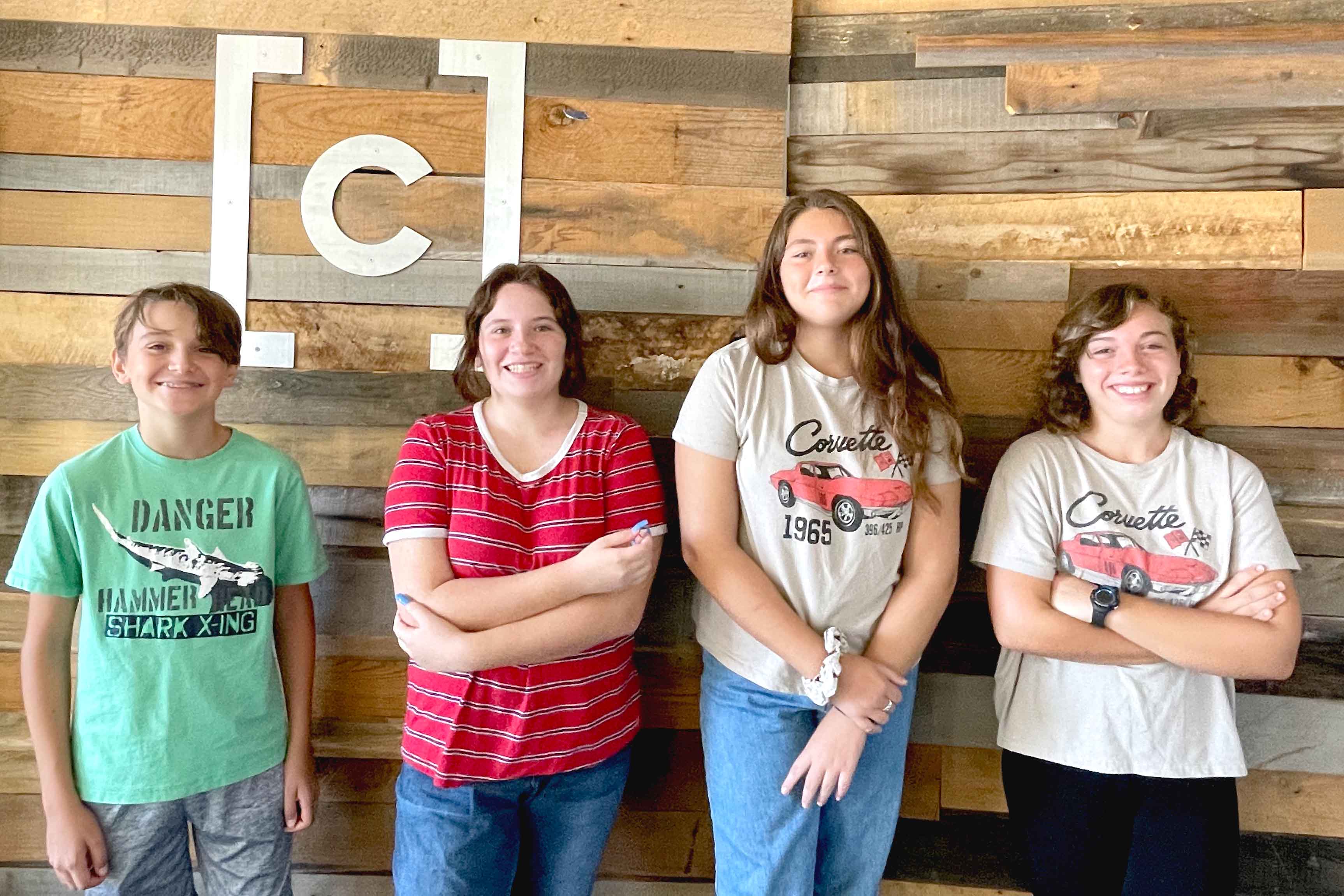 Photo of four teenagers from Communion's Youth Group