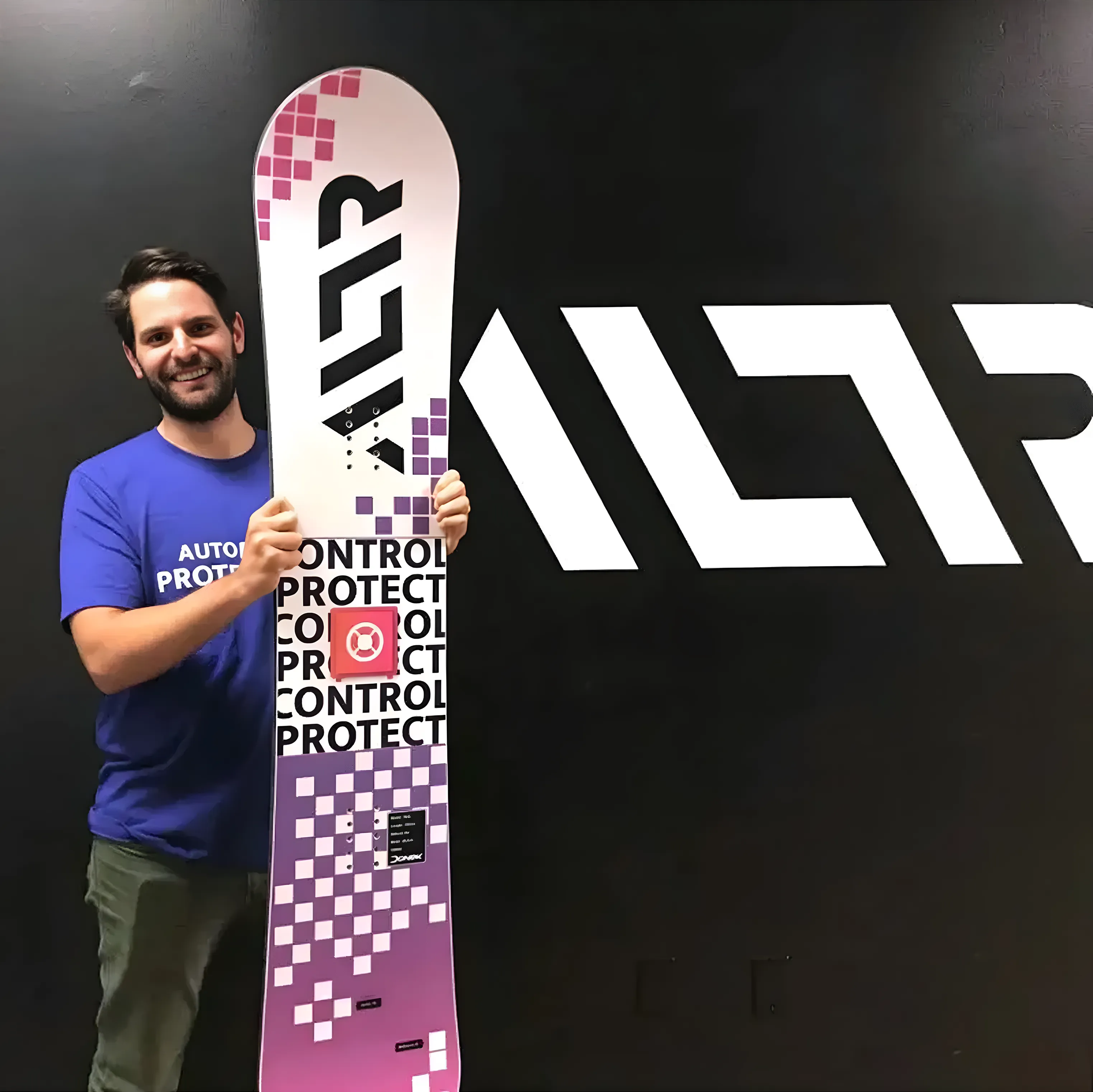 man holding a snowboard in ALTR Branding