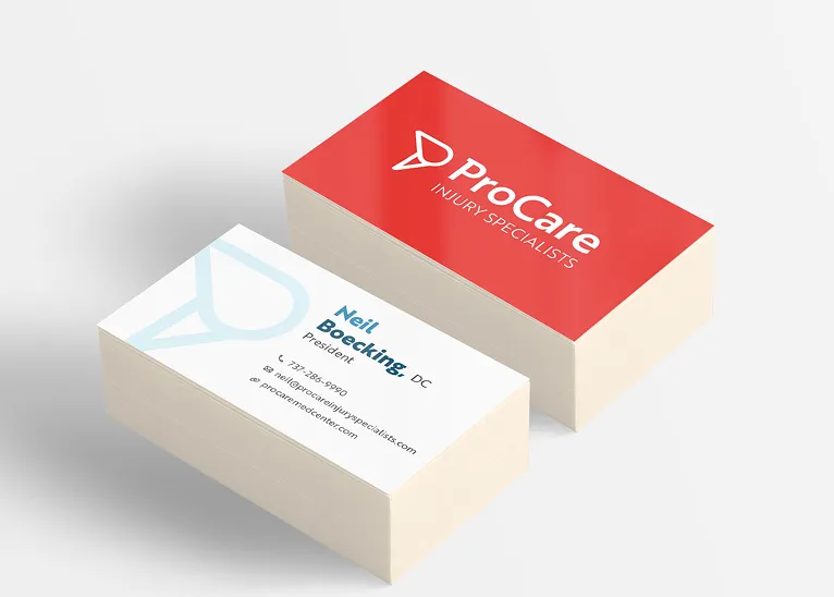 Stack of ProCare Injury Specialists business cards, showing the red front with logo and a white back with contact details.