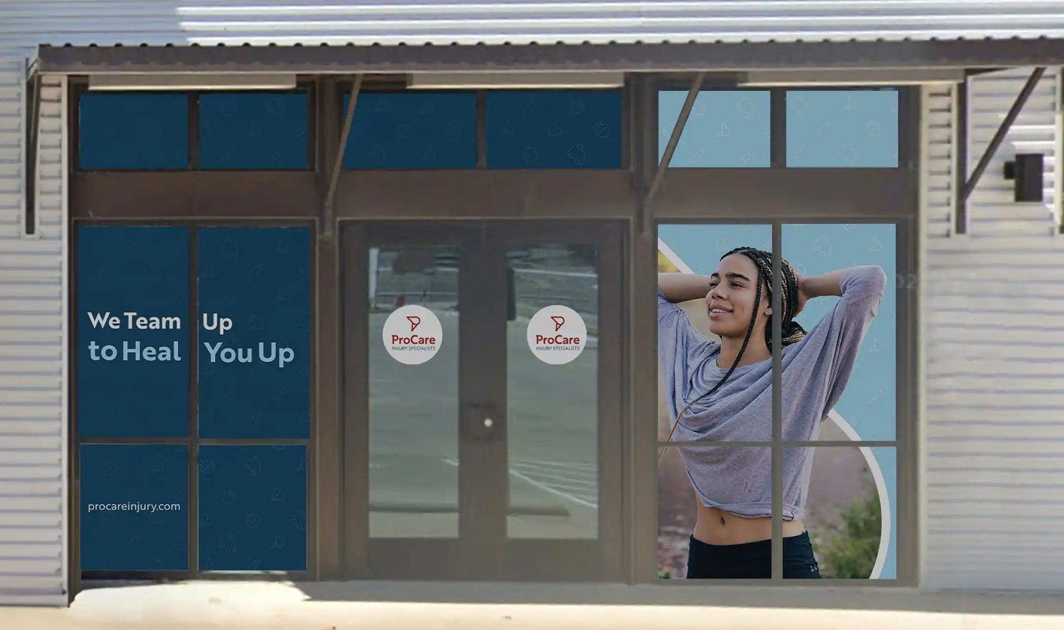 Front doors of ProCare Injury Specialists with window graphics including slogan 'We Team Up to Heal You Up' and image of a relaxed woman stretching outdoors.