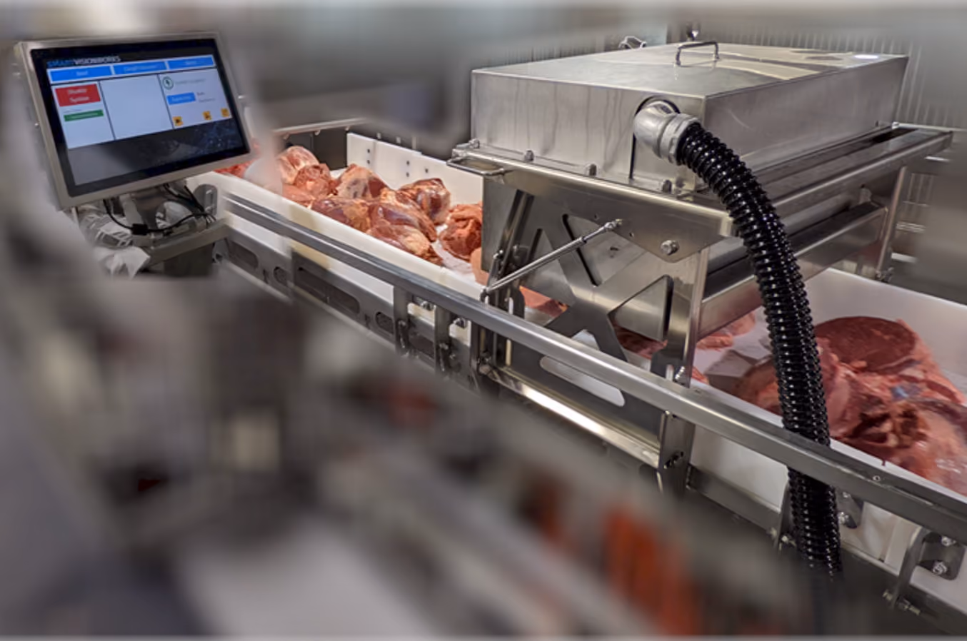 The SiftAI® Foreign Material Detection System inspecting raw beef trim for potentially hazardous foreign materials