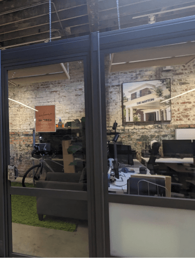 Two ladies having conversation in the office