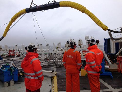 Team of engineers working on a marine installation project.