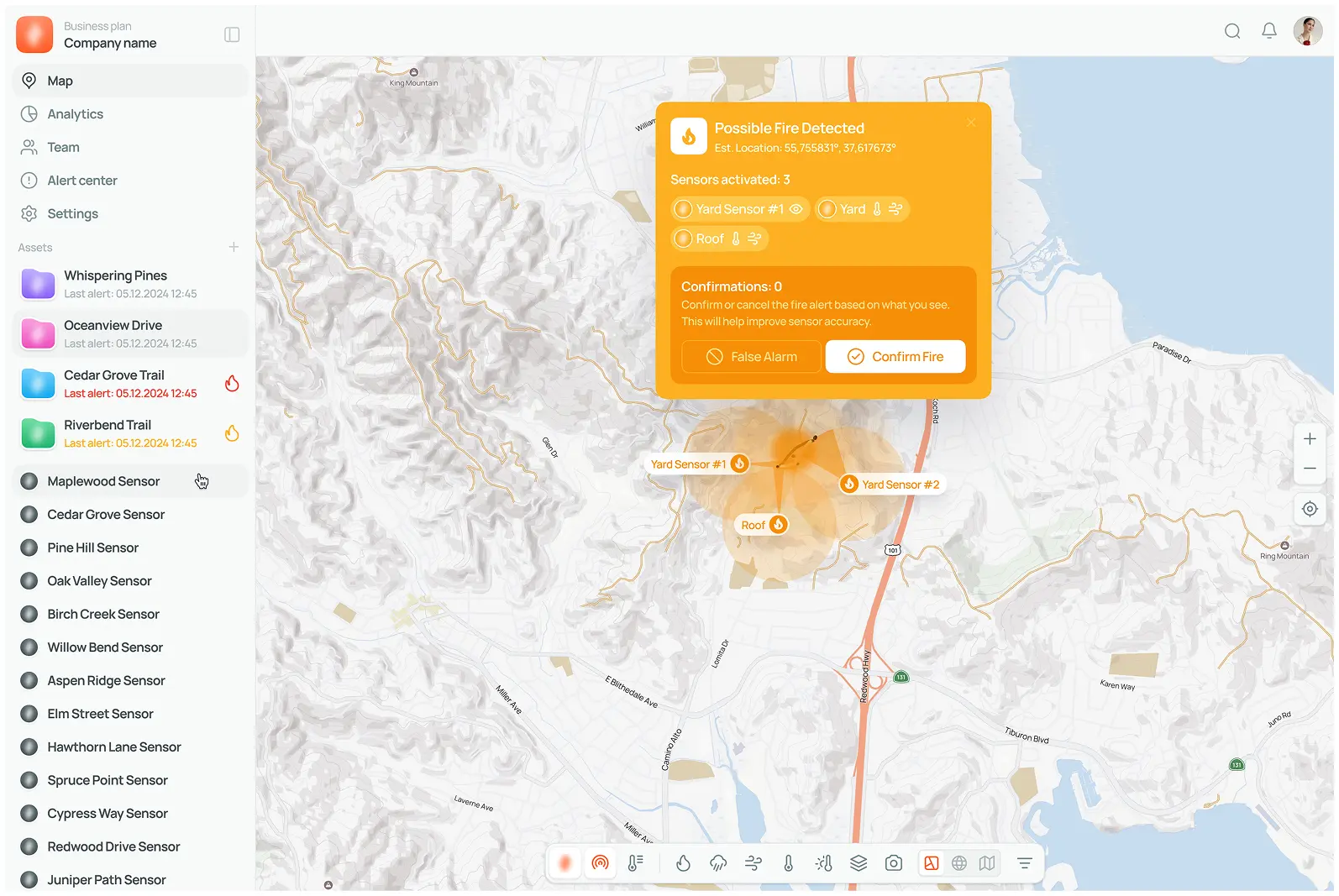 Map interface showing a possible fire detection alert with specific coordinates. Three sensor locations highlighted in orange. Sidebar lists various sensors.
