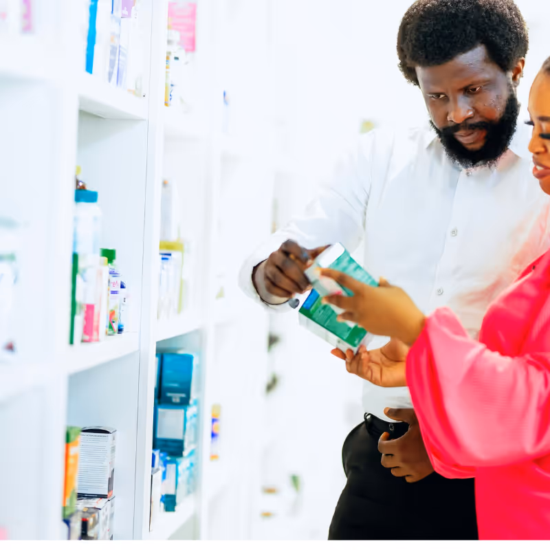 Hand holding a conventional skincare label with synthetic ingredients, contrasted by natural alternatives — highlighting the importance of clean ingredient awareness.