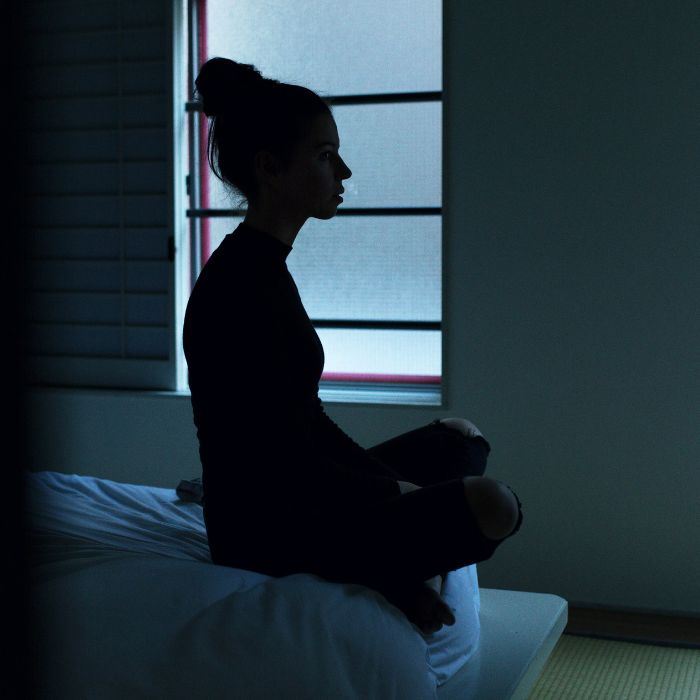 girl practicing home ritual before sleep 