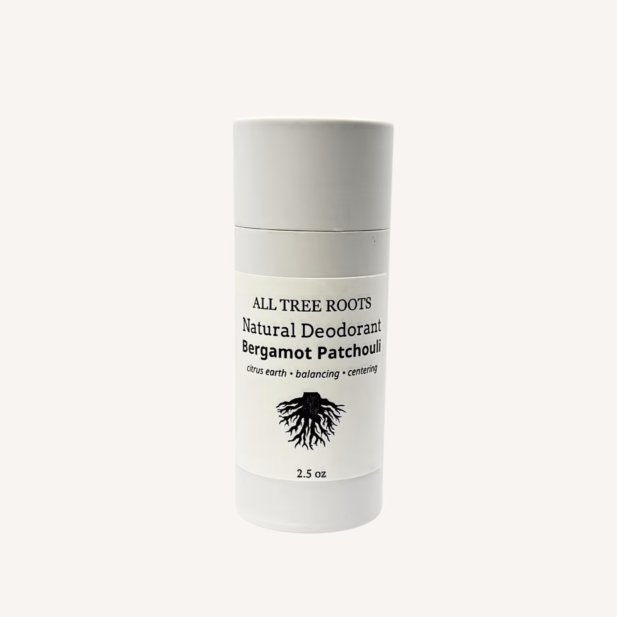 All Tree Roots natural deodorant in a compostable paper push-up tube on a neutral background.