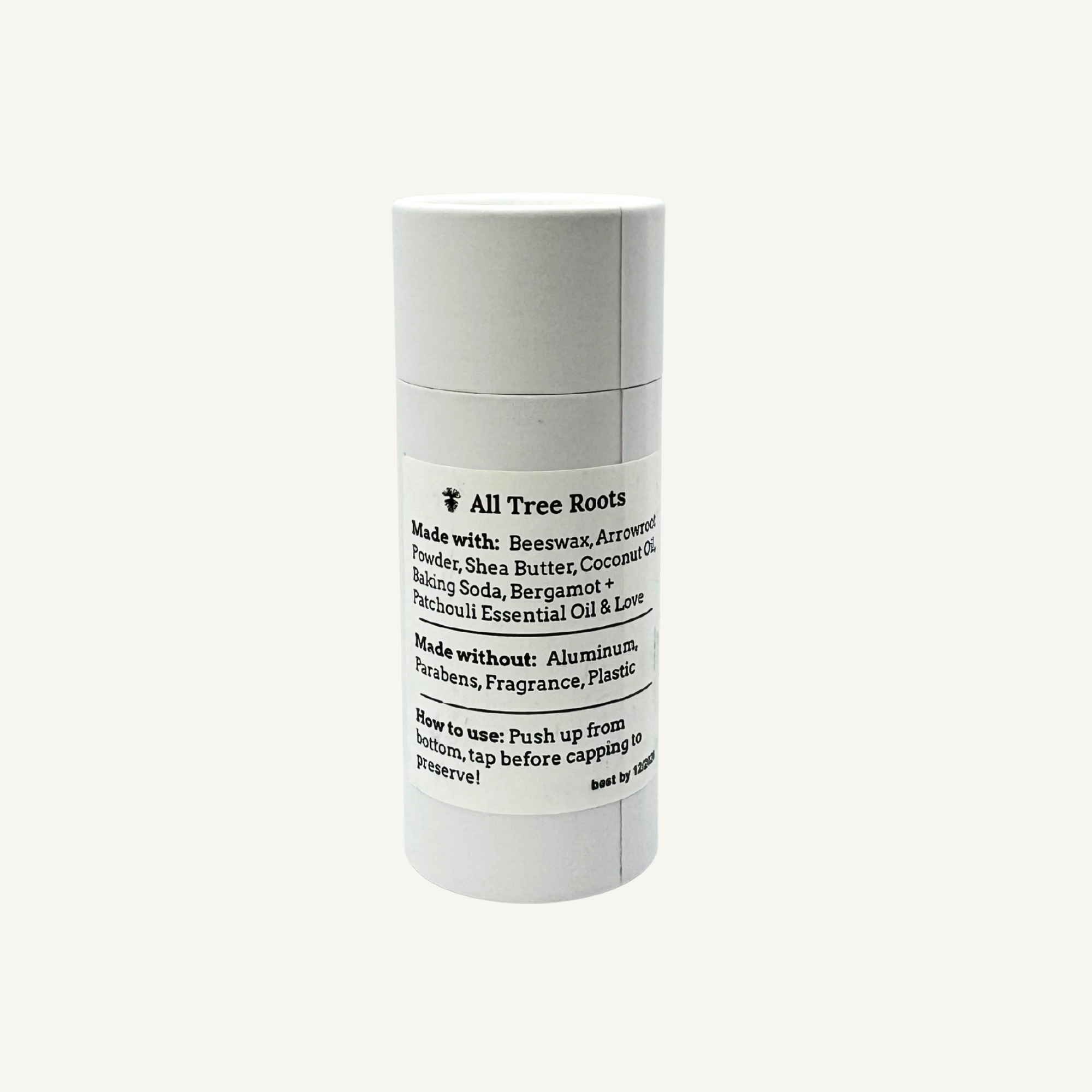Back label of All Tree Roots Bergamot Patchouli natural deodorant and their ingredients, in a biodegradable push-up tube, shown in a clean, minimal product photo..