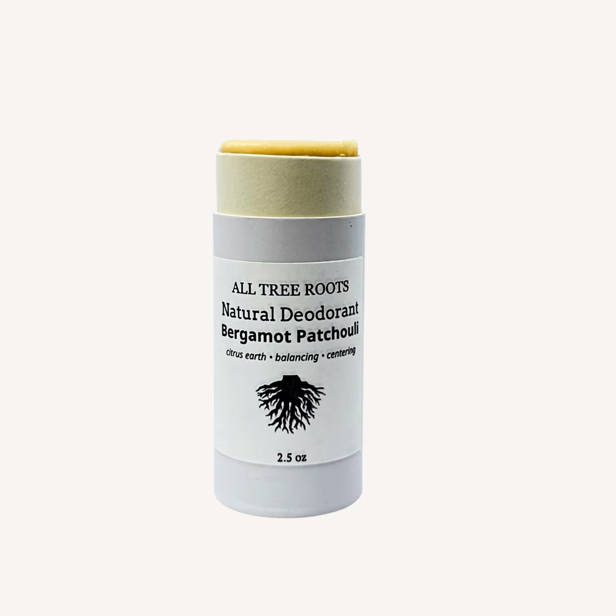 All Tree Roots natural deodorant with baking soda in a compostable paper push-up tube, bergamot patchouli