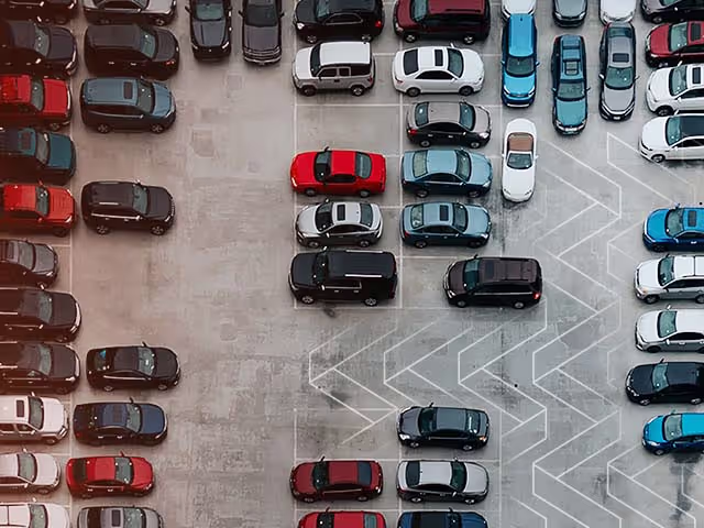 Used cars in a car dealership lot