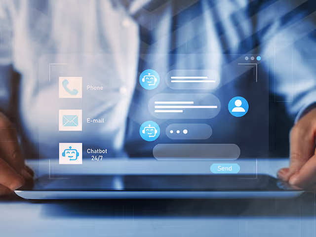 A used car salesperson reviews his interactions with a customer using an Automotive CRM