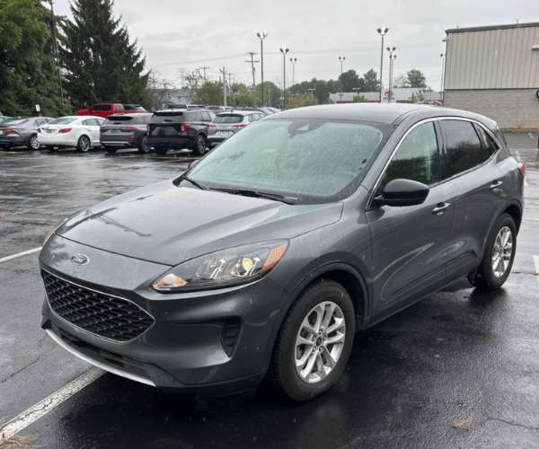 A used 2022 Ford Escape in a dealer parking lot