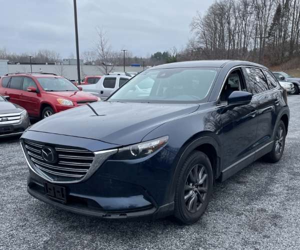 A 2022 Mazda CX-9 in a dealer parking lot