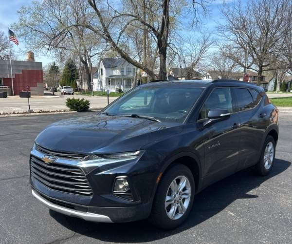 A black 2020 Chevrolet Blazer in a empty lot