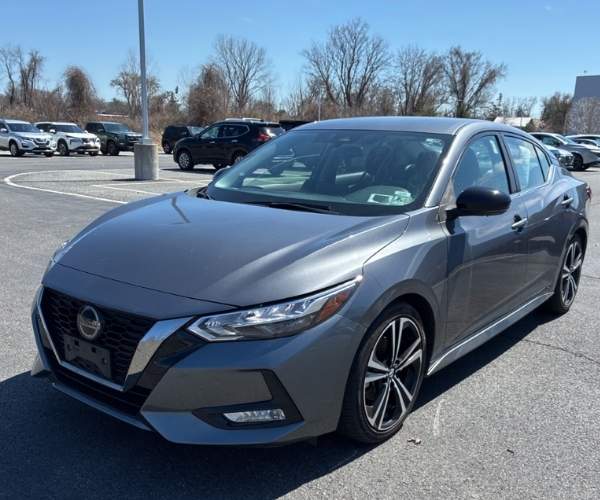 A grey 2021 Nissan Sentra in a parking lot