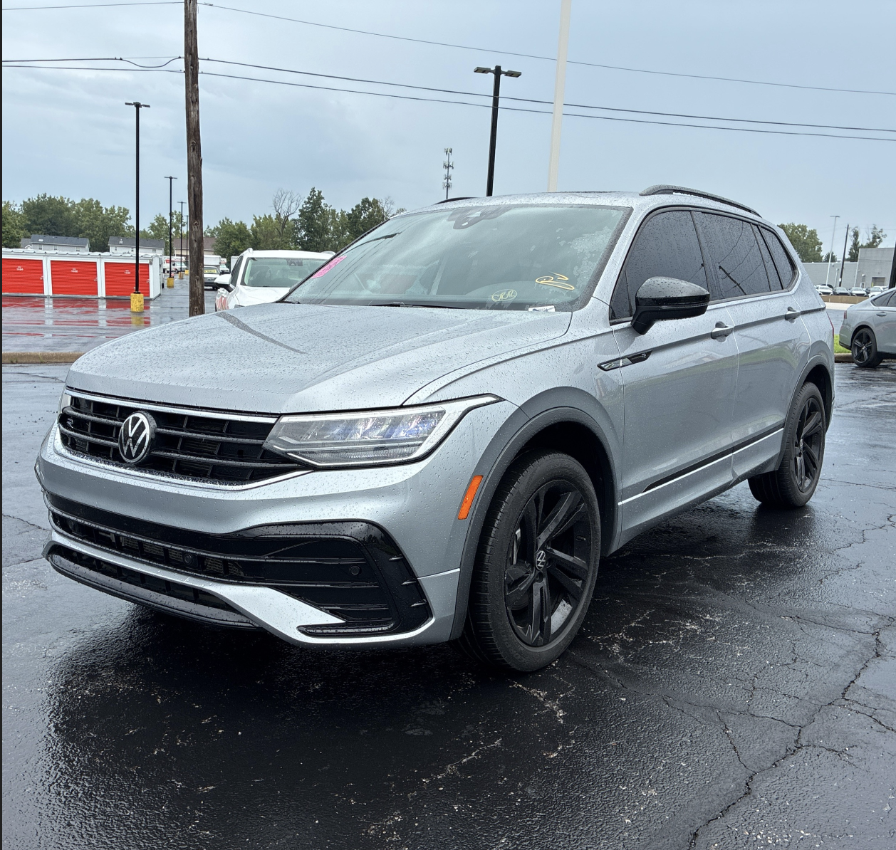 A 2023 VW Tiguan parked in a crowded lot