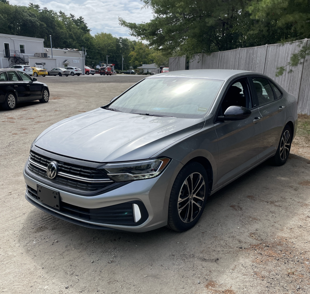 A silver 2024 Volkswagen Jetta parked in a dealer lot