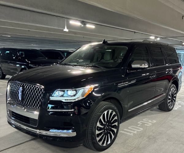 A black 2024 Lincoln Navigator in a parking garage
