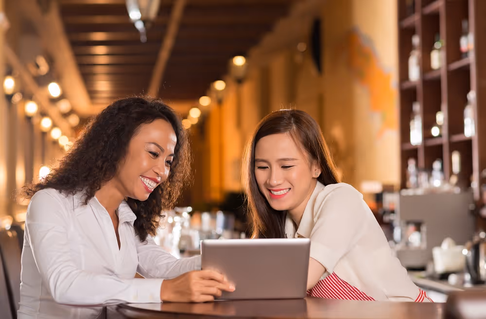 Women looking at tablet