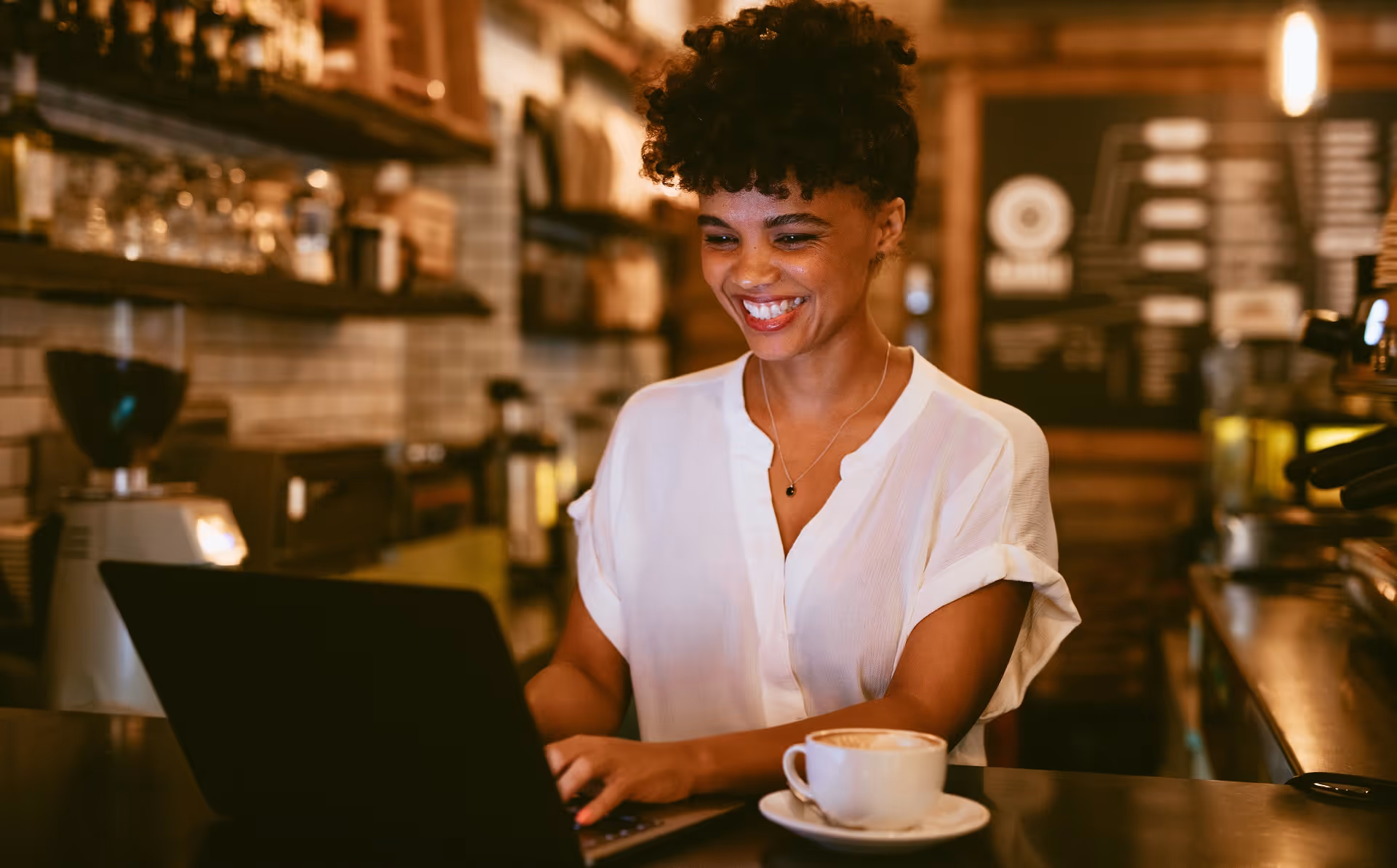 Woman at laptop typing