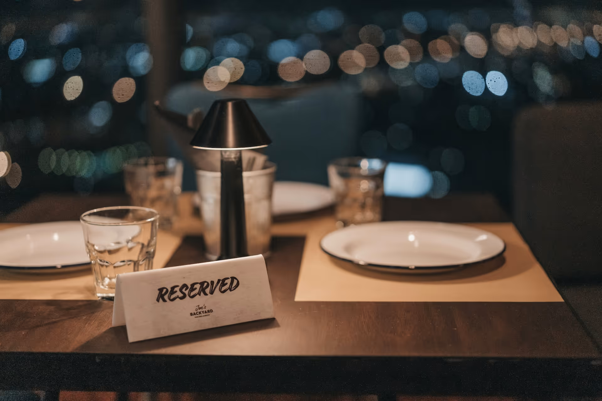 A fine dining restaurant table that is reserved